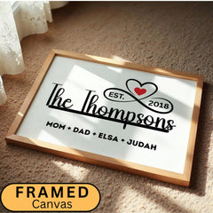 Personalized family name sign with custom family members print in a sleek black and white minimalist design. Framed canvas wall décor ideal for farmhouse, modern, or contemporary home settings. Thoughtful housewarming, wedding, or anniversary gift idea for families and couples. Perfect for display in living rooms, entryways, offices, or hallways as a meaningful keepsake. With infinity sign and a heart icon design, perfect for Christmas Season, Valentines and mother's day