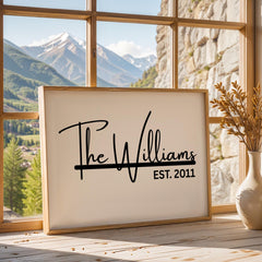 Custom framed canvas sign featuring a personalized family name and the anniversary date in a black and white minimalist style. Elegant wall art decor perfect for farmhouse, modern, or neutral-themed interiors. Ideal for home or office wall display in living rooms, entryways, or workspaces. Thoughtful housewarming, wedding, or anniversary gift idea with a timeless design.